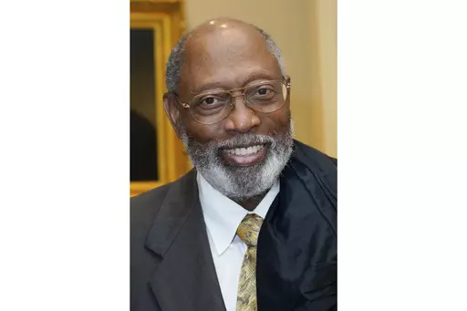 U.S. District Judge Henry Wingate smiles, Aug. 19, 2022, in Jackson, Miss. Wingate ruled Sunday, Dec. 31, 2023, that he will allow Mississippi officials to move forward with creating a state-run court in part of the majority-Black capital city of Jackson, over objections from the NAACP. (AP Photo/Rogelio V. Solis, File)