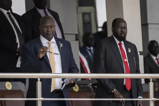 South Sudan's President Salva Kiir, right, and Vice President Riek Machar, left, attend a Holy Mass led by Pope Francis at the John Garang Mausoleum in Juba, South Sudan Sunday, Feb. 5, 2023. (AP Photo/Ben Curtis, File)