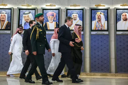 Saudi Arabia's Foreign Minister Prince Faisal bin Farhan bin Abdullah, right, and U.S. Secretary of State Antony Blinken, second right, walk to a Joint Ministerial Meeting of the GCC-U.S. Strategic Partnership to discuss the humanitarian crises faced in Gaza, in Riyadh, Saudi Arabia, Monday April 29, 2024. (Evelyn Hockstein/Pool via AP)