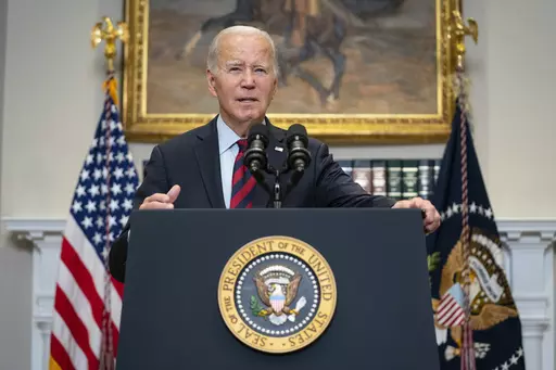 President Joe Biden talks with reporters after delivering remarks on student loan debt forgiveness, in the Roosevelt Room of the White House, Wednesday, Oct. 4, 2023, in Washington. On Friday, Sept. 6, The Associated Press reported on stories circulating online incorrectly claiming The Biden administration is giving people who enter the U.S illegally payments of $2,200 per month. (AP Photo/Evan Vucci, File)