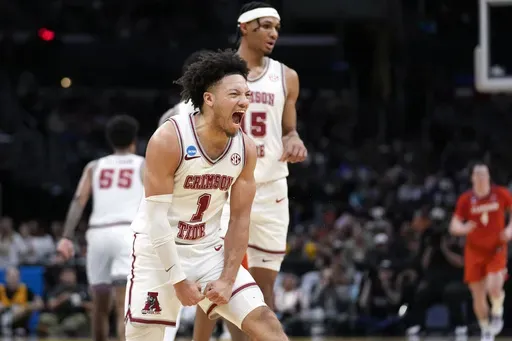 Alabama guard Mark Sears (1) celebrates after scoring during the first half of an Elite 8 college basketball game against Clemson in the NCAA tournament Saturday, March 30, 2024, in Los Angeles. (AP Photo/Ashley Landis, File)
