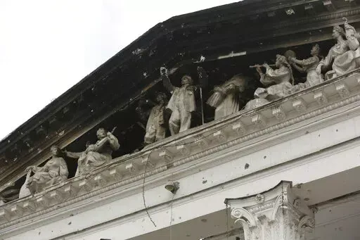 Part of the Donetsk Academic Regional Drama Theatre in Mariupol, Ukraine, is charred following a bombing on March 16, 2022, when the theater was used as a shelter, in an area now controlled by Russian forces Monday, April 4, 2022. The bombing of the theater stands out as the war's single deadliest known attack against civilians to date. (AP Photo/Alexei Alexandrov, File)
