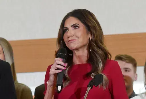South Dakota Governor Kristi Noem speaks after winning the gubernatorial primary at an election night watch party on Tuesday, June 7, 2022, at the Hilton Garden Inn in Sioux Falls, S.D. (Erin Woodiel/The Argus Leader via AP)
