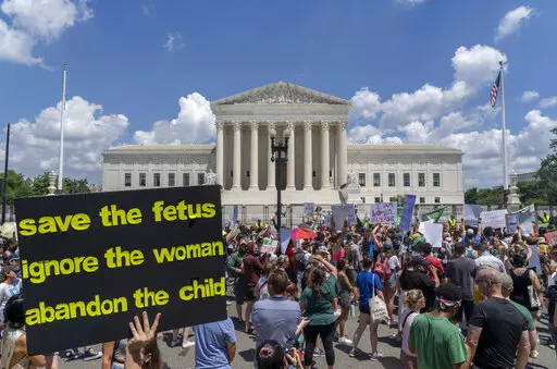 Abortion-rights protesters demonstrate outside the Supreme Court in Washington, Saturday, June 25, 2022. A new poll finds a growing percentage of Americans calling out abortion or women’s rights as priorities for the government in the wake of the Supreme Court’s decision to overturn Roe v. Wade, especially among Democrats and those who support abortion access.  (AP Photo/Gemunu Amarasinghe, File)