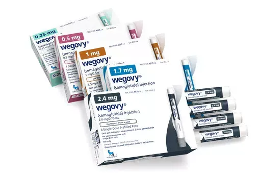 This image provided by Novo Nordisk in January 2023, shows packaging for the company's Wegovy drug. Children struggling with obesity should be evaluated and treated early and aggressively, with medications for kids as young as 12 and surgery for those as young as 13 who qualify, according to new guidelines released by the American Academy of Pediatrics on Monday, Jan. 9, 2023. A study published in the New England Journal of Medicine in December 2022, found that Wegovy helped teens reduce their b