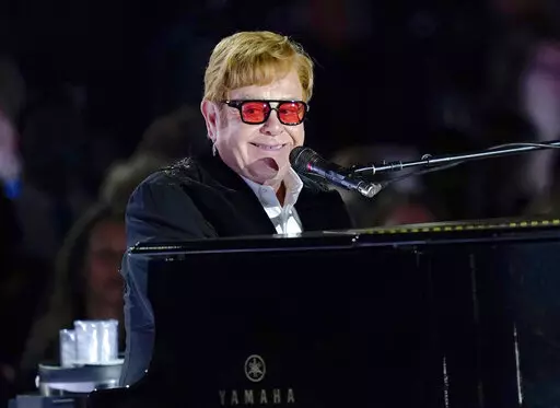 Elton John performs on the South Lawn of the White House in Washington, Friday, Sept. 23, 2022. Elton John is scheduled to perform at the Glastonbury Festival in June, in what organizers say will be his last-ever show in Britain. The festival announced Friday, Dec. 2, 2022 that the star will play the 2023 festival’s final night on June 25 (AP Photo/Susan Walsh, File)