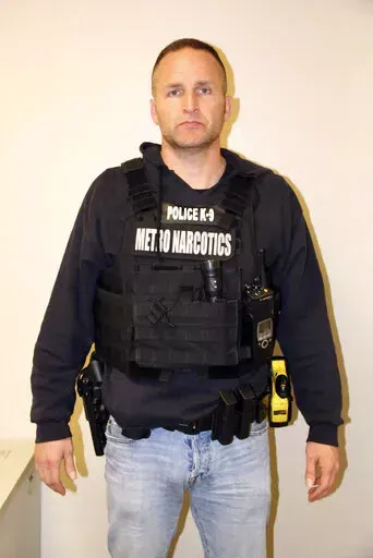 This March 13, 2020, photo provided by the Louisville Metro Police Department shows Officer Brett Hankison. A judge has denied a request from the legal team of Hankison, who took part in the deadly 2020 raid on Breonna Taylor’s home, to bar the media from part of his upcoming trial. But Jefferson Circuit Judge Ann Bailey Smith ruled Thursday, Jan. 27, 2022, that the media can’t bring cameras into the courtroom while individual prospective jurors are questioned ahead of the trial. (Louisville