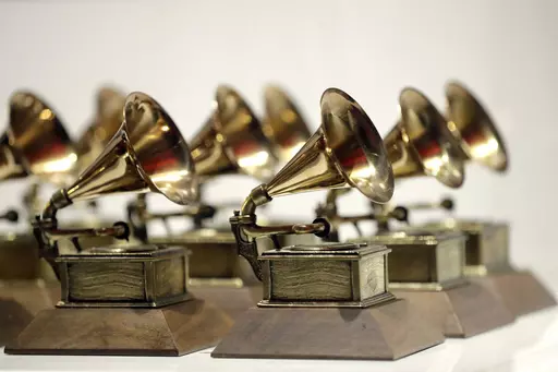 Grammy Awards are displayed at the Grammy Museum Experience at Prudential Center in Newark, N.J. on Oct. 10, 2017. The Recording Academy has announced three new categories to be added to the 2024 Grammy Awards: Best Pop Dance Recording, Best African Music Performance, and Best Alternative Jazz Album. (AP Photo/Julio Cortez, File)