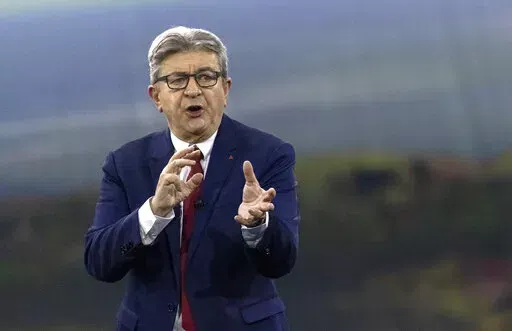French Far-left presidential candidate for the 2022 election Jean-Luc Melenchon gestures as he speaks during a meeting in Nantes, western France, Sunday, Jan. 16, 2022. Jean-Luc Melenchon used to call Russia a "partner," even as European governments were scrambling to find ways to avert a Russian invasion of Ukraine. He now supports the Ukrainian's "resistance" and Russians who are opposing the war and fighting "dictatorship" in their own country. (AP Photo/Jeremias Gonzalez, File)