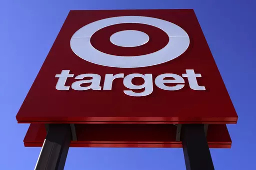 The bullseye logo on a sign outside the Target store in Quincy, Mass., Monday, Feb. 28, 2022. Target says it will stop selling a product dedicated to Civil Rights icons after a now-viral TikTok spotlighted some significant errors. (AP Photo/Charles Krupa, File)