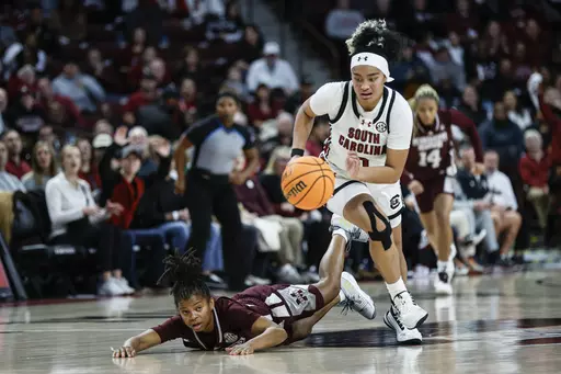 South Carolina guard Te-Hina Paopao, right, steals the ball from Mississippi State guard Lauren Park-Lane during the first half of an NCAA college basketball game in Columbia, S.C., Sunday, Jan. 7, 2024. (AP Photo/Nell Redmond)