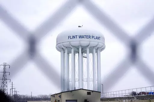 The Flint water plant tower is pictured on Jan. 6, 2022, in Flint, Mich. A judge dismissed criminal charges against former Michigan Gov. Rick Snyder in the Flint water crisis, months after the state Supreme Court said indictments returned by a one-person grand jury were invalid. (AP Photo/Carlos Osorio, File)