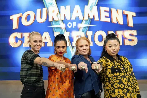 This image released by Warner Bros. Discovery shows winners of Food Network's "Tournament of Champions," from left, Brooke Williamson, Maneet Chauhan, Tiffani Faison, and Mei Lin. (Anders Krusberg/Warner Bros. Discovery via AP)