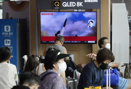 A TV screen shows an image of North Korea's missile launch during a news program at the Seoul Railway Station in Seoul, South Korea, Wednesday, July 12, 2023. North Korea launched a ballistic missile toward its eastern waters Wednesday, its neighbors said, two days after the North threatened “shocking” consequences to protest what it called a provocative U.S. reconnaissance activity near its territory.(AP Photo/Ahn Young-joon)