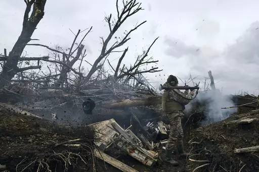 A Ukrainian soldier fires an RPG toward Russian positions at the frontline near Avdiivka, an eastern city where fierce battles against Russian forces have been taking place, in the Donetsk region, Ukraine, on April 28, 2023. Two years after Russia’s full-scale invasion captured nearly a quarter of the country, the stakes could not be higher for Kyiv. After a string of victories in the first year of the war, fortunes have turned for the Ukrainian military, which is dug in, outgunned and outnumb