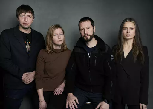 Photographer Evgeniy Maloletka, from left, "Frontline" producer/editor Michelle Mizner, director Mstyslav Chernov, and field producer Vasilisa Stepanenko pose for a portrait to promote the film "20 Days in Mariupol" at the Latinx House during the Sundance Film Festival on Sunday, Jan. 22, 2023, in Park City, Utah. The film is a joint project between The Associated Press and PBS "Frontline." (Photo by Taylor Jewell/Invision/AP, File)