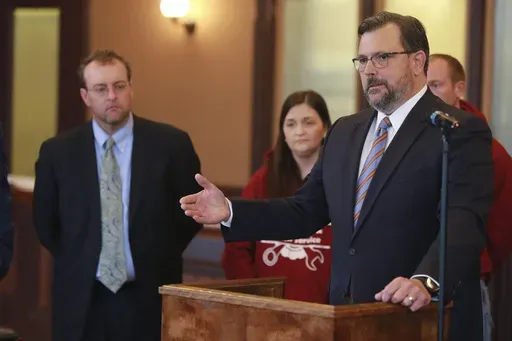 District Attorney John Weddle, right, speaks to reporters at the Pontotoc County Courthouse, in Pontotoc, Miss., Dec. 6, 2021. (Adam Robison/The Northeast Mississippi Daily Journal via AP, File)