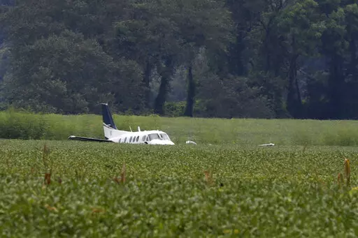A stolen airplane rests in a field of soybeans after crash-landing near Ripley, Miss., on Sept. 3, 2022. Cory Wayne Patterson, 29, an airport worker who flew a stolen plane erratically over north Mississippi and threatened to crash into a Walmart in September, has died Monday, Nov. 14, 2022, in a federal prison in Miami, where he was being held while awaiting trial. (AP Photo/Nikki Boertman, File)