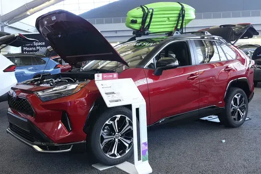 A Toyota RAV4 Prime is displayed at the Pittsburgh International Auto Show in Pittsburgh, Feb. 15, 2024. (AP Photo/Gene J. Puskar, File)