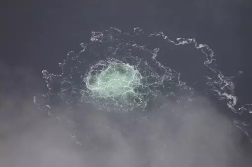 In this picture provided by Swedish Coast Guard, a leak from Nord Stream 2 is seen, on Sept. 28, 2022. Germany’s defense minister voiced caution Wednesday March 8, 2023 over media reports that a pro-Ukraine group was involved in blowing up the Nord Stream gas pipelines in the Baltic Sea last year. (Swedish Coast Guard via AP, File)