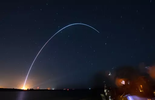 Spectators at Jetty Park in Cape Canaveral, Fla., watch as Terran I, a 3D-printed rocket by Relativity Space, lifts off from Cape Canaveral Space Force Station late Wednesday, March 22, 2023. (Craig Bailey/Florida Today via AP)