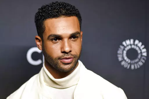 Lucien Laviscount attends a screening of "Emily in Paris" during PaleyFest on Sunday, April 10, 2022, at the Dolby Theater in Los Angeles. During interviews in recent weeks, The Associated Press asked celebrities promoting their own projects in Europe what they planned to watch this winter season. Laviscount, who plays Emily's love interest Alfie in "Emily in Paris", chases said he was into “anything inspiration, inspiring stuff.” (Photo by Richard Shotwell/Invision/AP, File)