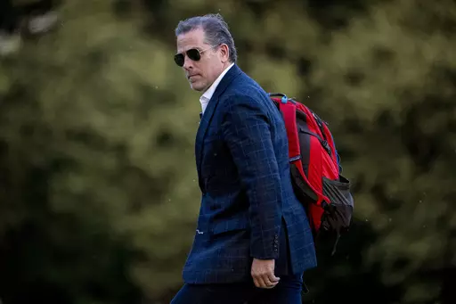 Hunter Biden, the son of President Joe Biden, walks from Marine One upon arrival at Fort McNair, June 25, 2023, in Washington. The Republican chairmen of three key House committees are joining forces to probe the Justice Department's handling of charges against Hunter Biden after making sweeping claims about misconduct at the agency. (AP Photo/Andrew Harnik, File)