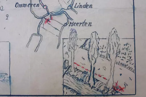 Detail of the map showing where the Nazi loot was reportedly buried in Ommeren, near Arnhem, is seen at the National Archive of the Netherlands in The Hague, Monday, Jan. 23, 2023. A hand-drawn map with a red letter X purportedly showing the location of a buried stash of precious jewellery looted by Nazis from a blown-up bank vault has sparked a modern-day treasure hunt in a tiny Dutch village. (AP Photo/Peter Dejong)