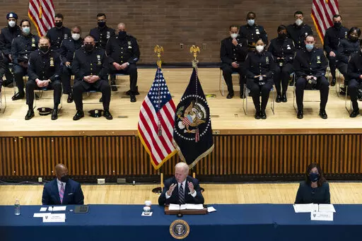 President Joe Biden speaks at an event with New York City Mayor Eric Adams, left, and Gov. Kathy Hochul, D-N.Y., to discuss gun violence strategies, at police headquarters, Thursday, Feb. 3, 2022, in New York. (AP Photo/Alex Brandon)