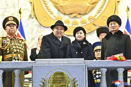 In this photo provided by the North Korean government, North Korean leader Kim Jong Un, center left, with his daughter attends a military parade to mark the 75th founding anniversary of the Korean People’s Army on Kim Il Sung Square in Pyongyang, North Korea Wednesday, Feb. 8, 2023. Independent journalists were not given access to cover the event depicted in this image distributed by the North Korean government. The content of this image is as provided and cannot be independently verified. Kor