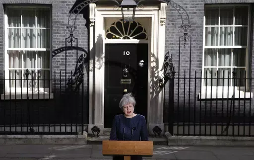 Britain's Prime Minister Theresa May speaks to the media outside her official residence of 10 Downing Street in London, Tuesday April 18, 2017. Theresa May, who succeeded David Cameron after he resigned following Britain's vote to leave the European Union in a referendum in June 2016, sought to capitalize on the Conservative Party's big opinion poll lead and called an early general election for June 2017. (AP Photo/Alastair Grant, File)