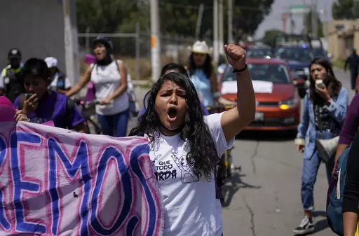 Roxana Ruiz shouts slogans during a march in memory of Diana Velazquez, who was making a call outside her home in 2017 when she was disappeared, raped and killed, in Chimalhuacan, State of Mexico, Mexico, July 2, 2022. Ruiz, who killed a man defending herself when he attacked and raped her in 2021 was sentenced to more than six years in prison, a decision her legal defense called “discriminatory” and vowed to appeal Tuesday, May 16, 2023.(AP Photo/Eduardo Verdugo, File)