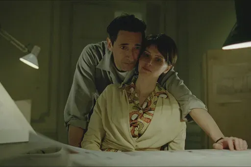This image released by A24 shows Adrien Brody, left, and Felicity Jones in a scene from "The Brutalist." (A24 via AP)