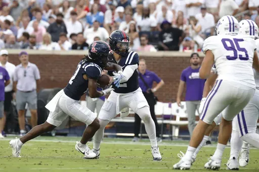 Mississippi quarterback Jaxson Dart (2) passes the ball during the first half of an NCAA college football game against Furman, Saturday, Aug. 31, 2024, in Oxford, Miss. (AP Photo/Sarah Warnock)