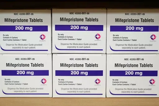 Boxes of the drug mifepristone sit on a shelf at the West Alabama Women's Center in Tuscaloosa, Ala., March 16, 2022. An “anti-vice” law from the 19th century is at the center of a new court ruling that could soon halt access to the leading abortion drug in the U.S. On Friday, April 7, 2023, a Trump-appointed judge in Texas sided with Christian conservatives in ruling that the Comstock, enacted in the 1870s, prohibits sending the long-used drug through the mail. (AP Photo/Allen G. Breed, Fil