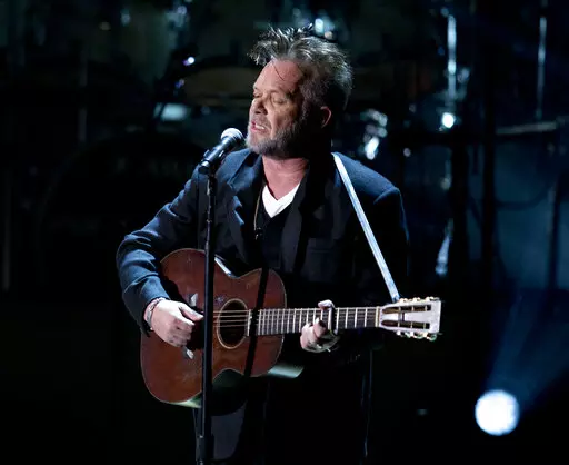John Mellencamp performs during a tribute concert to Billy Joel, the recipient of the Library of Congress Gershwin Prize for Popular Song in Washington on Nov. 19, 2014. Mellencamp's 1985 album “Scarecrow” is being reissued this week. (AP Photo/Carolyn Kaster, File)