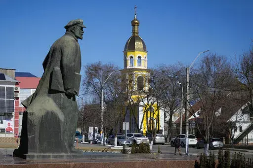The monument of Soviet founder Vladimir Lenin seen in the center of Comrat, Moldova, Saturday, March 12, 2022. Across the border from war-engulfed Ukraine, tiny, impoverished Moldova, an ex-Soviet republic now looking eagerly Westward, has watched with trepidation as the Russian invasion unfolds. In Gagauzia, a small, autonomous part of the country that's traditionally felt closer to the Kremlin than the West, people would normally back Russia, which they never wanted to leave when Moldova gaine