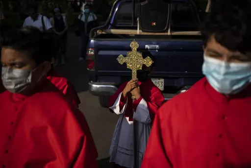 Catholics take part in a reenactment of the Stations of the Cross during the Lenten season at the Metropolitan Cathedral in Managua, Nicaragua, Friday, March 17, 2023. Amid tensions between the Vatican and the Daniel Ortega government, Catholics staged the devotional commemoration of Jesus Christ's last day on Earth in the gardens of the Cathedral due to the police ban on celebrating religious festivities on the streets. Nineteen priests kicked out of the country, dozens of incidents of harassme
