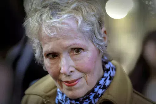 E. Jean Carroll listen as she meets with reporters outside a courthouse in New York, on March 4, 2020. Former President Donald Trump’s legal moves aimed at delaying a rape accuser Carroll's defamation claims from reaching trial are in bad faith and, so far, succeeding, a judge said in a decision released Friday, March 11, 2022, as he rejected an attempt by Trump to countersue.  (AP Photo/Seth Wenig, File)