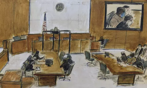 In this courtroom sketch, Frank James, seated at center of right table, and on left of the screen, upper right, appears during the brief proceeding in a federal court in the Brooklyn borough of New York, Thursday, April 14, 2022. James, accused of opening fire on a crowded subway train in Brooklyn, was ordered held without bail as prosecutors told a judge Thursday he terrified all of New York City. (AP Photo/Elizabeth Williams)