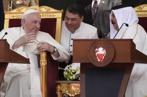 Pope Francis talks with Bahrain's King Hamad bin Isa Al Khalifa as they attend the closing session of the "Bahrain Forum for Dialogue: East and west for Human Coexistence", at the Al-Fida square at the Sakhir Royal palace, Bahrain, Friday, Nov. 4, 2022. Pope Francis is making the November 3-6 visit to participate in a government-sponsored conference on East-West dialogue and to minister to Bahrain's tiny Catholic community, part of his effort to pursue dialogue with the Muslim world. (AP Photo/A