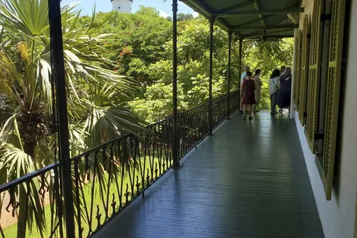 A second-floor balcony at the Hemingway Home & Museum in Key West, Florida, on Wednesday, July 17, 2024. Ernest Hemingway and his then-wife, Pauline, bought the home in 1931. It was turned into a museum in 1964. (AP Photo/David Fischer)