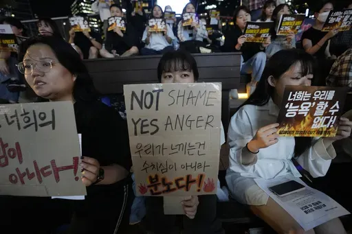 Citizens stage a rally against deepfake sex crime in Seoul, South Korea, Friday, Sept. 27, 2024. (AP Photo/Ahn Young-joon)