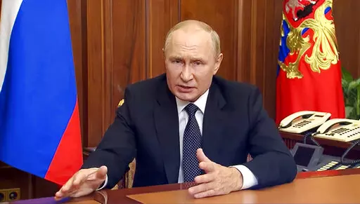 In this image taken from video released by the Russian Presidential Press Service, Russian President Vladimir Putin gestures as he addresses the nation in Moscow, Russia, Sept. 21, 2022. Four occupied regions in eastern and southern Ukraine are set to start voting Friday Sept. 23, 2022, in referendums on whether to become part of Russia. (Russian Presidential Press Service via AP, File)