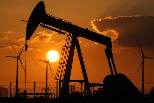 A pumpjack extracts crude at an oil field in Emlichheim, Germany, March 18, 2022. Before the war in Ukraine, Europe's most pressing energy policy goal was reducing carbon emissions that cause climate change. Now, officials are fixated on rapidly reducing the continent's reliance on Russian oil and natural gas — and that means friction between security and climate goals, at least in the short term. (AP Photo/Martin Meissner)