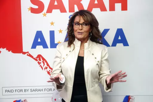 Former Alaska Gov. Sarah Palin addresses supporters at the opening of her new campaign headquarters in Anchorage, Alaska, on Wednesday, April 20, 2022. Voters are whittling down the list of 48 candidates running for Alaska's only U.S. House seat, with the top four vote-getters in a special primary on Saturday, June 11, advancing to an August special election. (AP Photo/Mark Thiessen,File)