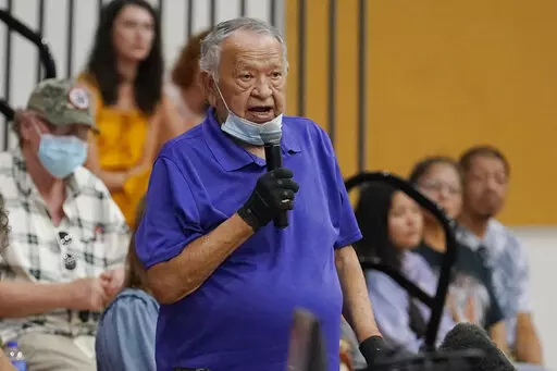 Donald Neconie, 84, a former U.S. Marine and member of the Kiowa Tribe, recounts his experiences as a child at an Indian boarding school Saturday, July 9, 2022, in Anadarko, Okla., during a meeting to hear about the painful experiences of Native Americans who were sent to government-backed boarding schools designed to strip them of their cultural identities. One by one, Native American tribal elders who were once students at government-backed Indian boarding schools testified about the hardships