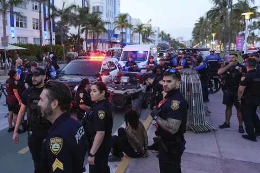 City of Miami Beach police officers respond to an incident during spring break, March 15, 2024, in Miami Beach, Fla. (AP Photo/Rebecca Blackwell, File)