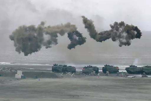 Taiwan's military holds drills of the annual Han Kuang military exercises that simulate an anti-landing operations near the coast in New Taipei City, northern Taiwan, Thursday, July 27, 2023. Taiwan military mobilized for routine defense exercises from July 24-28. The U.S. is set to announce $345 million in military aid for Taiwan, two U.S. officials said Friday. It would be the Biden administration's first major package drawing on America's own stockpiles under a new policy intended to speed up
