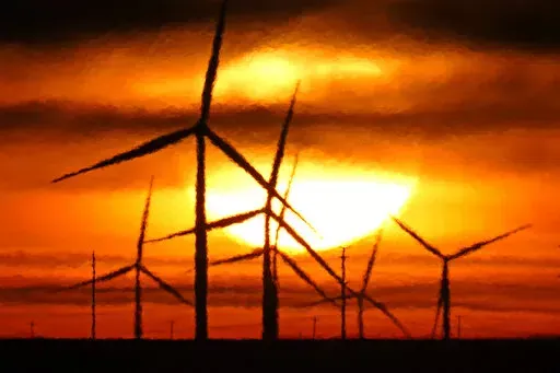 Wind turbines are silhouetted against the rising sun Wednesday, Jan. 13, 2021, near Spearville, Kan.  A new study released on Wednesday, April 13, 2022, finds that if the nations of the world live up to their promises, future climate climate change can be limited to the weaker of two international goals. According to a study, the world is potentially on track to keep global warming at or a shade below 2 degrees Celsius (3.6 degrees Fahrenheit) hotter than pre-industrial times, a goal that once s